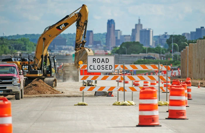 What signs are needed to secure road workshops?